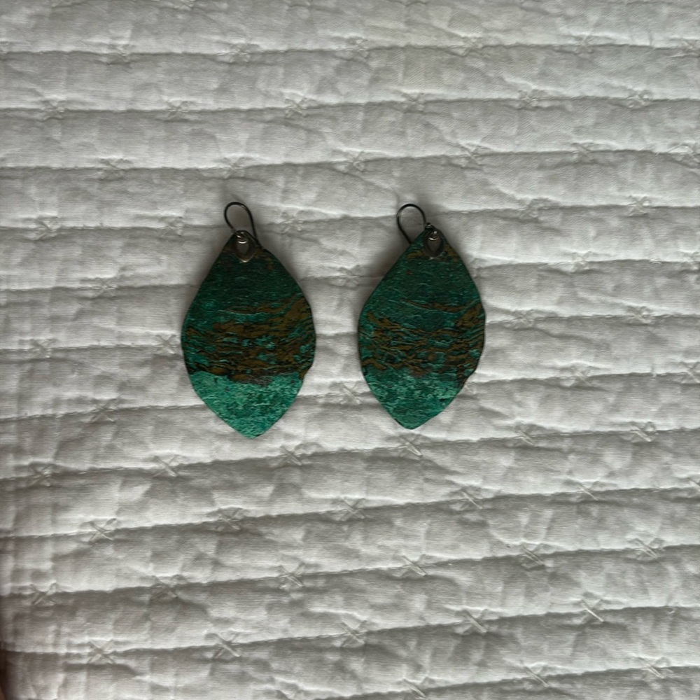 Gold Silpada earrings with green/turquoise design on front, pre owned.